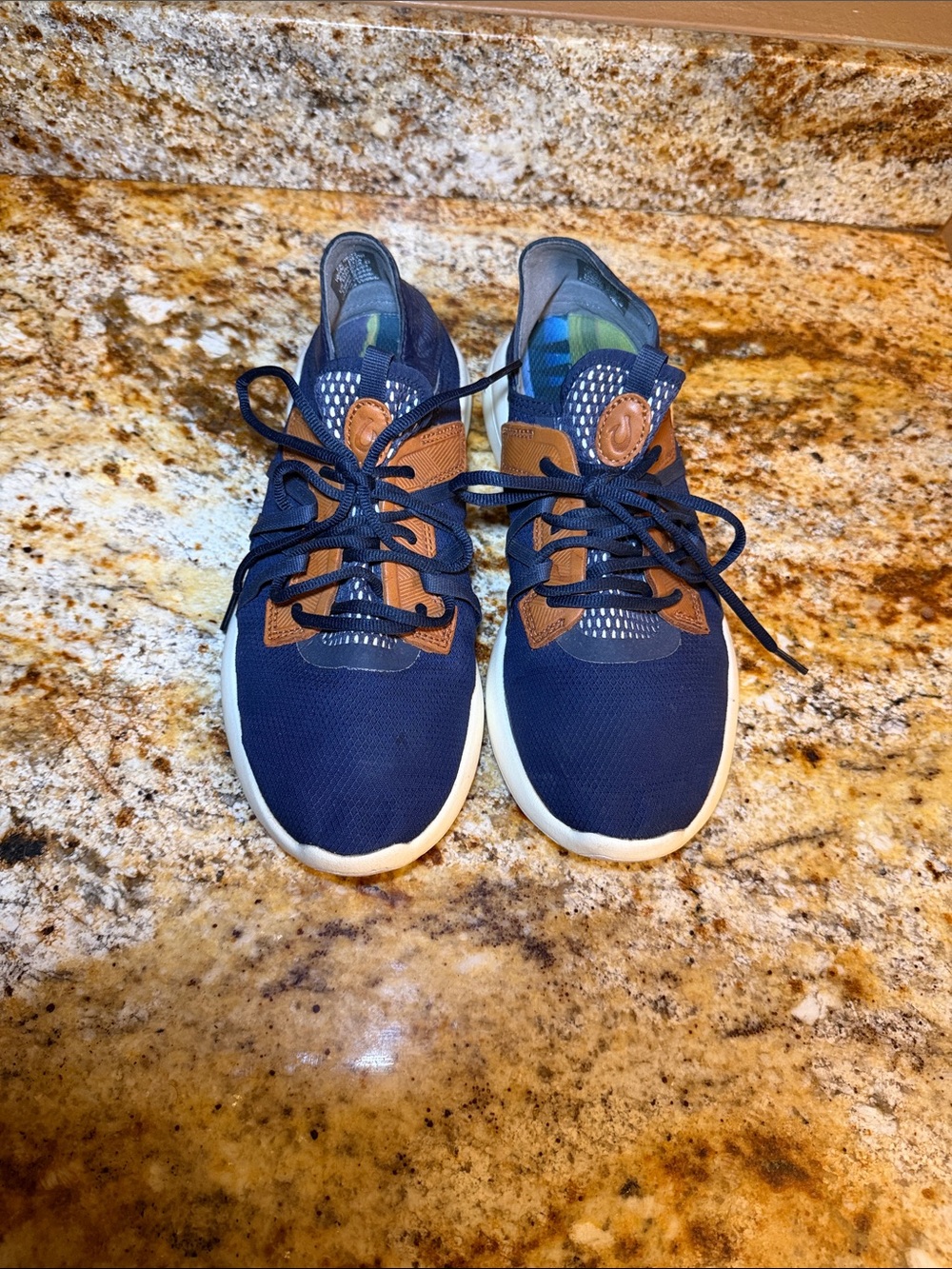 OluKai Mio Li lightweight sneakers in the Deep Navy / Saddle colorway